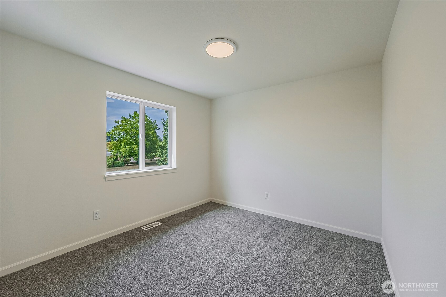 960 RW Fletcher Street Winlock, WA 98596 - Photo 31 of 40 an empty room with a window