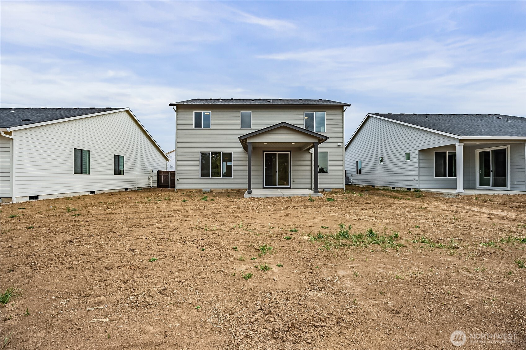 960 RW Fletcher Street Winlock, WA 98596 - Photo 39 of 40 a front view of a house with a dry yard