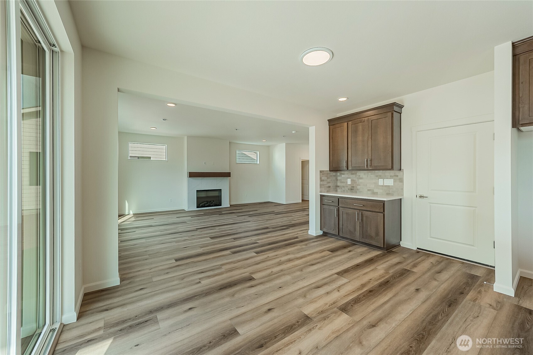 960 RW Fletcher Street Winlock, WA 98596 - Photo 10 of 40 a room with a bed and a view of kitchen