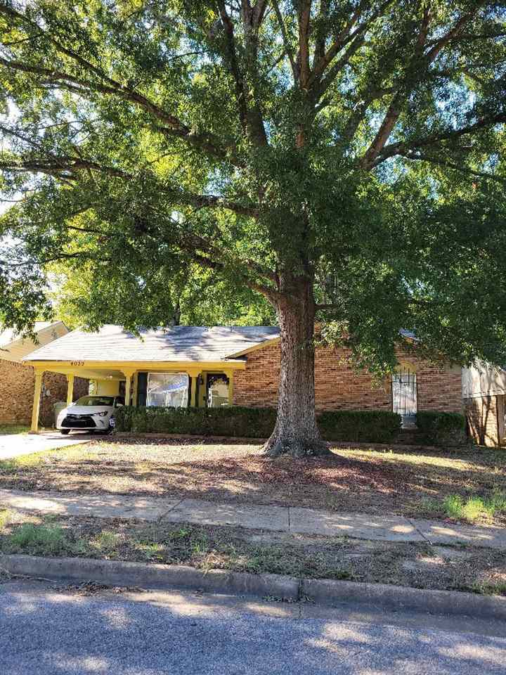 4039 Hobson Road Memphis, TN 38128 - Photo 1 of 9 a view of a house with a yard