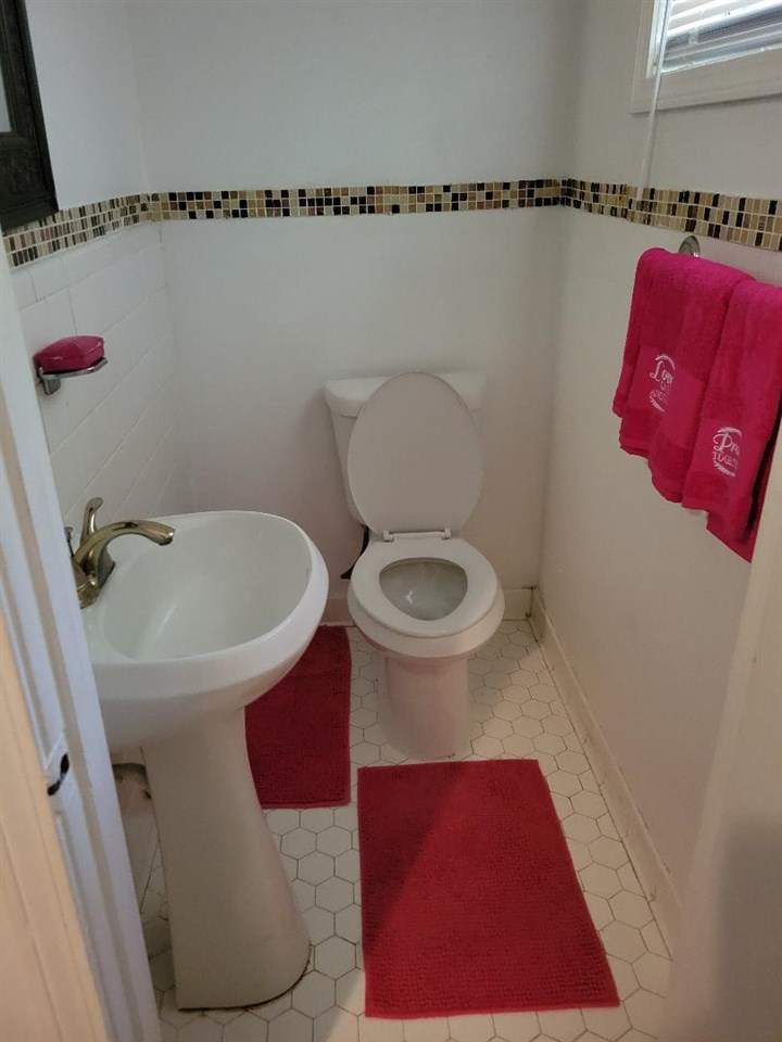 4039 Hobson Road Memphis, TN 38128 - Photo 9 of 9 a bathroom with a shower and a toilet