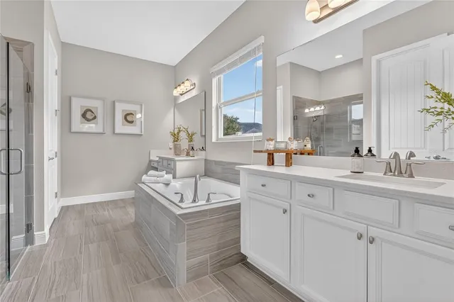 a view of a house with swimming pool and sitting area