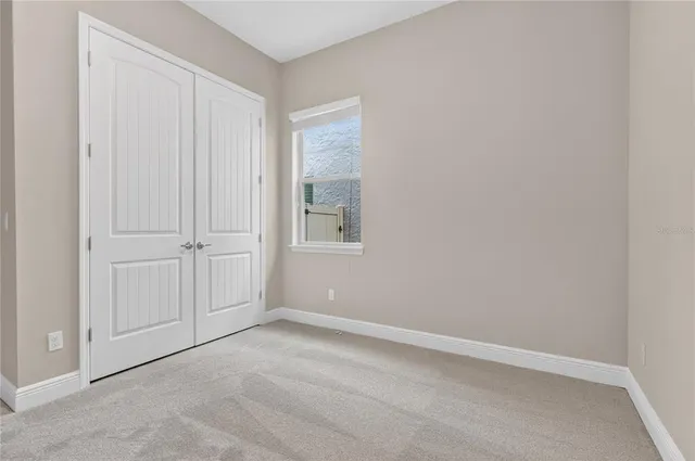 a front view of house with yard outdoor seating and barbeque oven