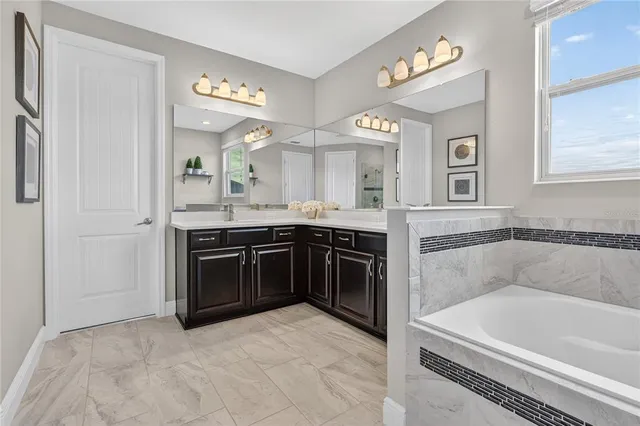 an aerial view of a house with a garden