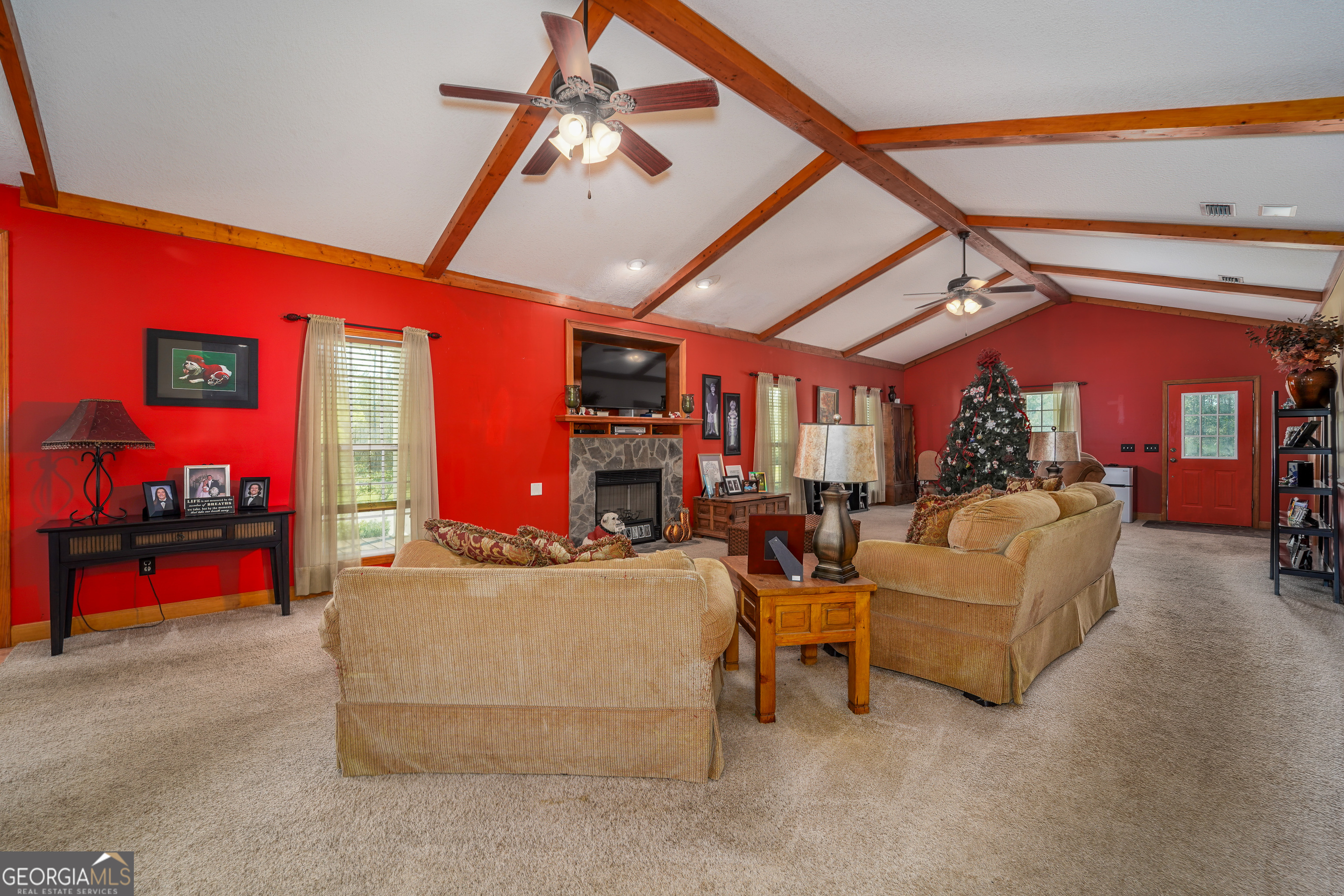 3300 Connor Lane Waycross, GA 31503 - Photo 19 of 42 a living room with furniture and a chandelier