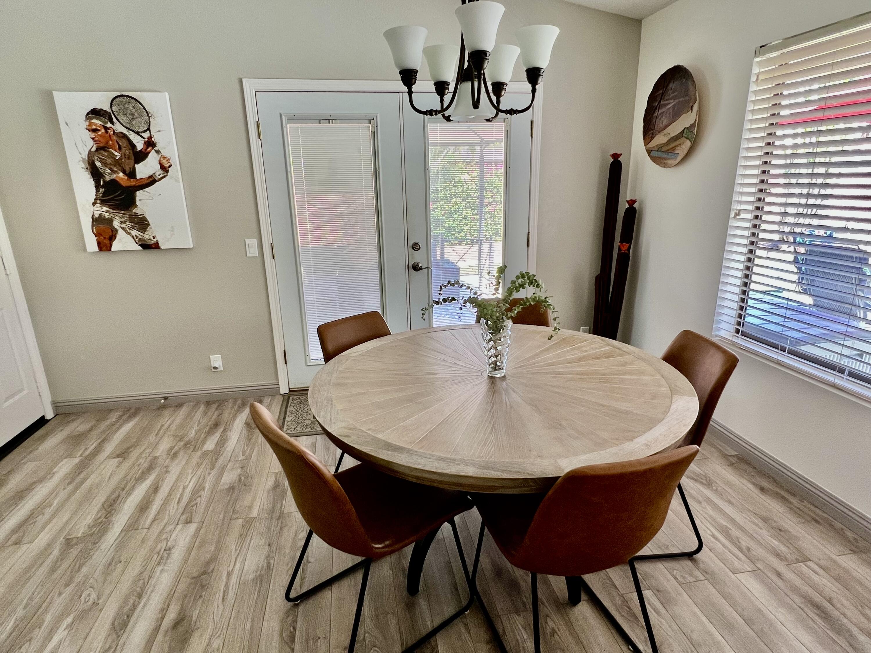 43622 Warner Trail Palm Desert, CA 92211 - Photo 18 of 51 a view of a dining room with furniture and window