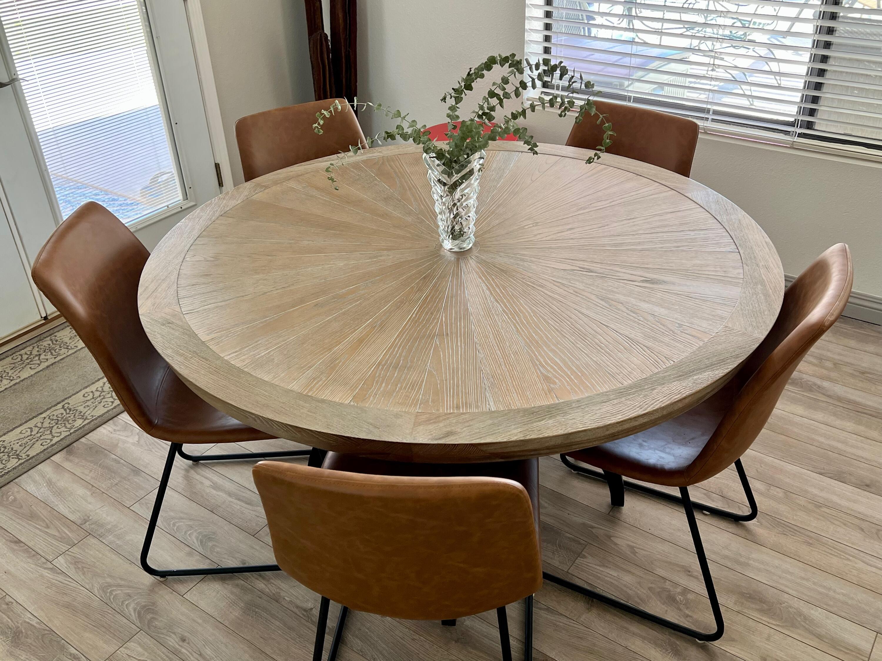 43622 Warner Trail Palm Desert, CA 92211 - Photo 19 of 51 a view of a dining room with furniture and wooden floor