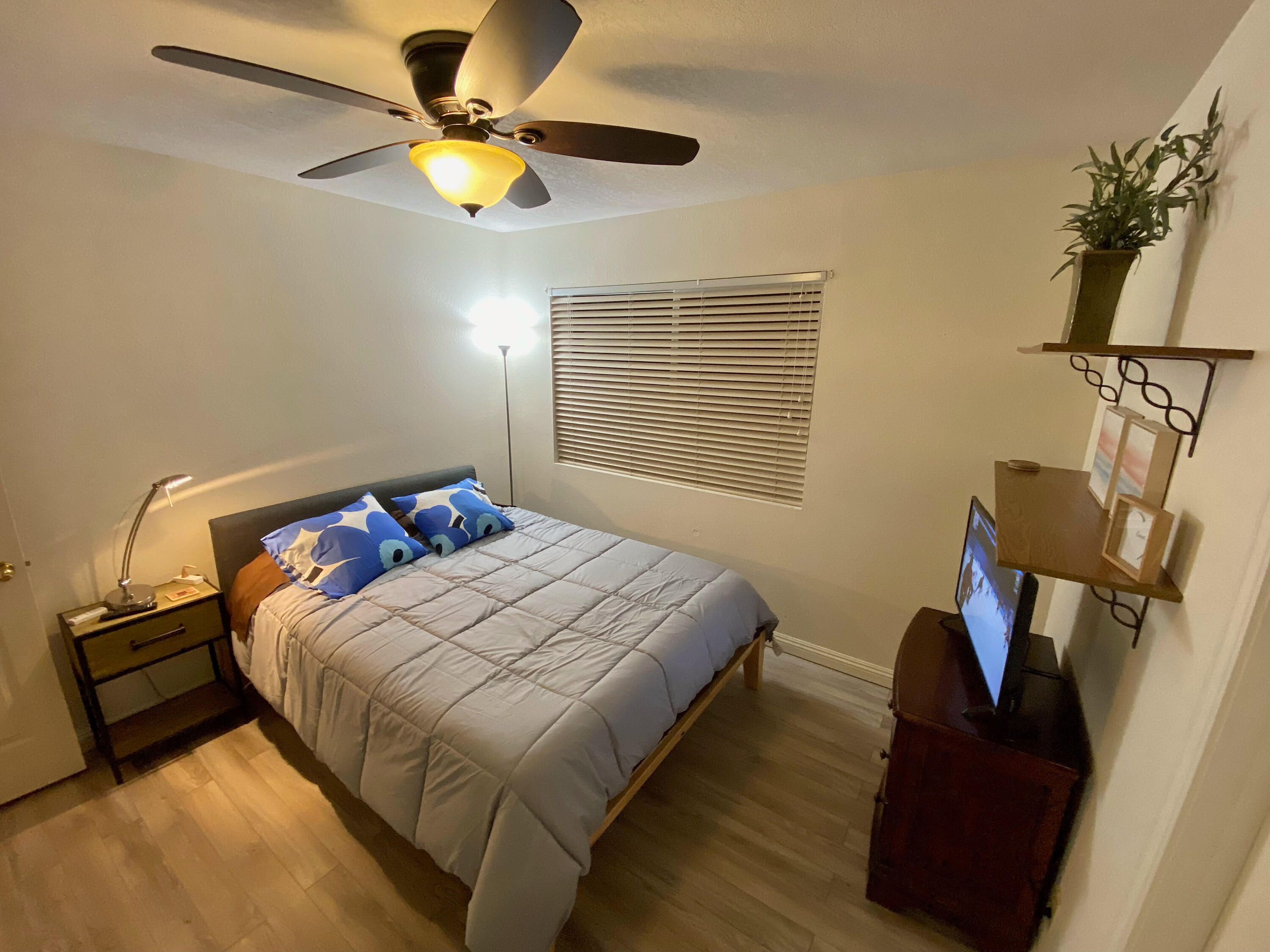 43622 Warner Trail Palm Desert, CA 92211 - Photo 24 of 51 a bed sitting in a bedroom next to a window