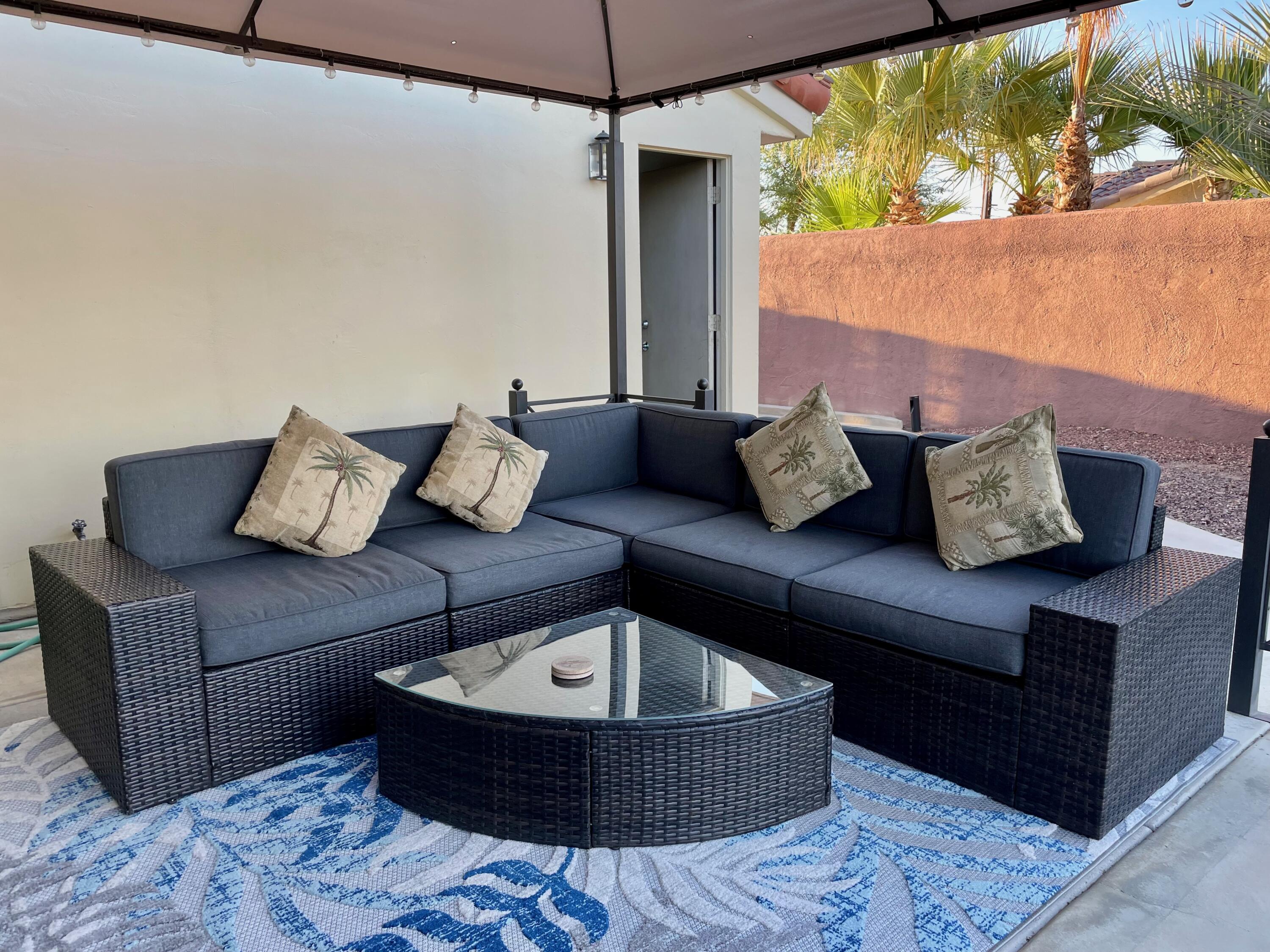43622 Warner Trail Palm Desert, CA 92211 - Photo 30 of 56 a living room with furniture and a window