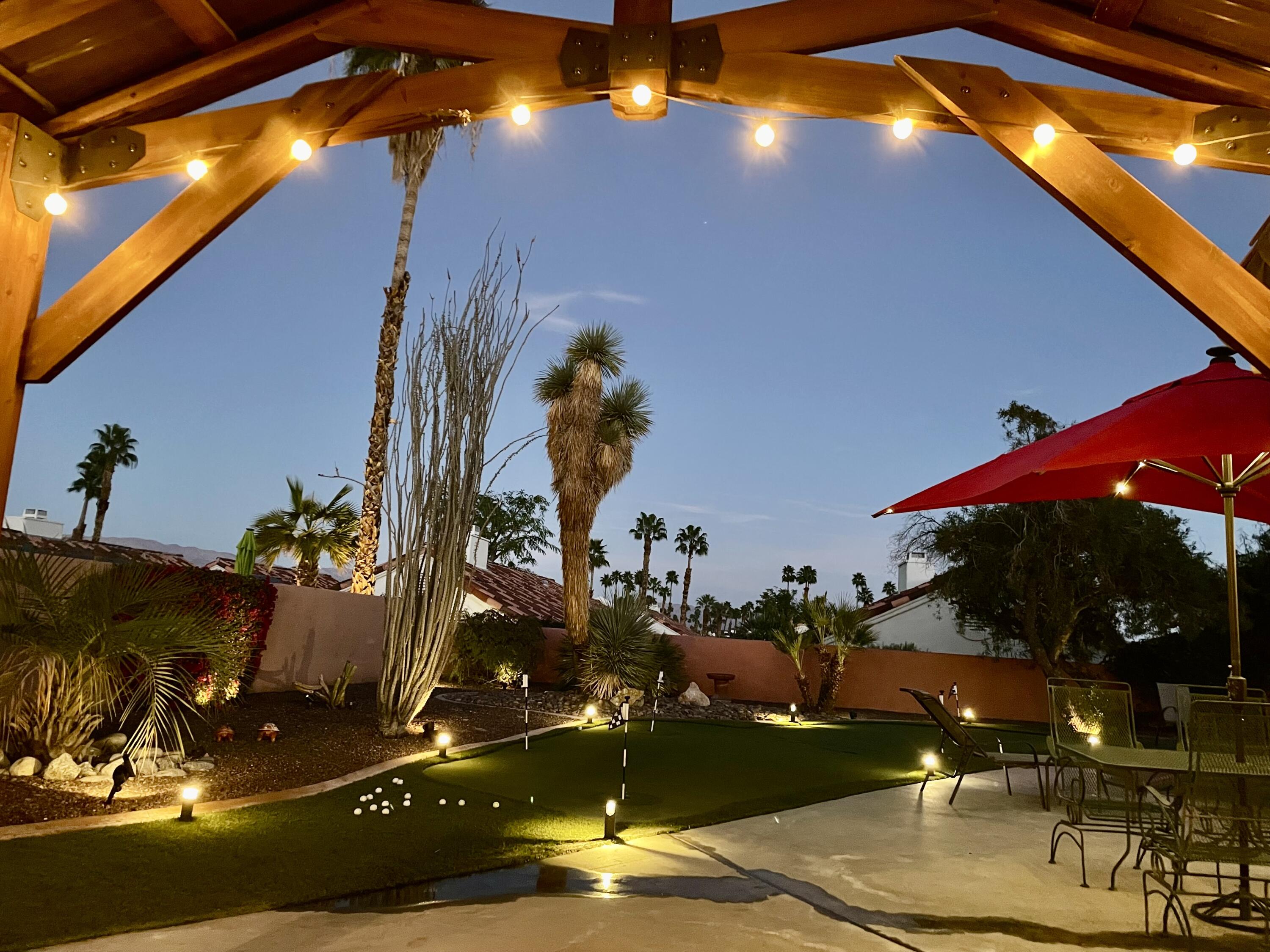 43622 Warner Trail Palm Desert, CA 92211 - Photo 3 of 51 a view of a house with a backyard