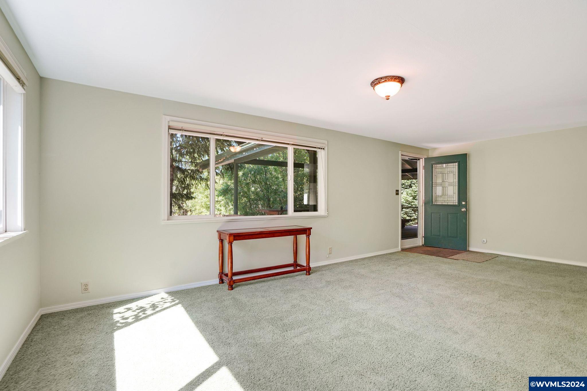 1787 Cochrane Lane Dallas, OR 97338 - Photo 19 of 42 an empty room with windows