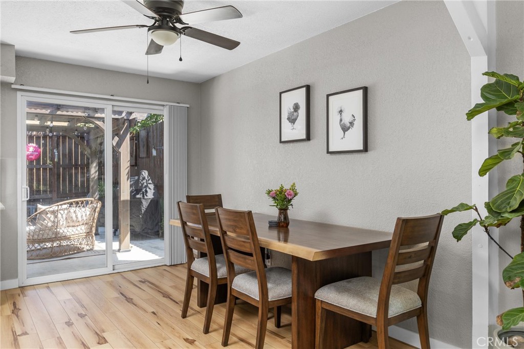 4913 Sparrow Hawk Lane Paso Robles, CA 93446 - Photo 12 of 33 a view of a dining room with furniture window and wooden floor