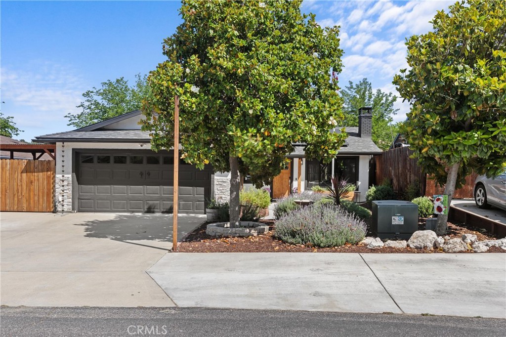 4913 Sparrow Hawk Lane Paso Robles, CA 93446 - Photo 6 of 33 a front view of a house with garden