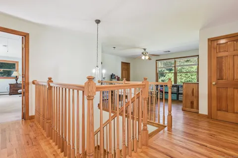 a view of a chairs and table in a room