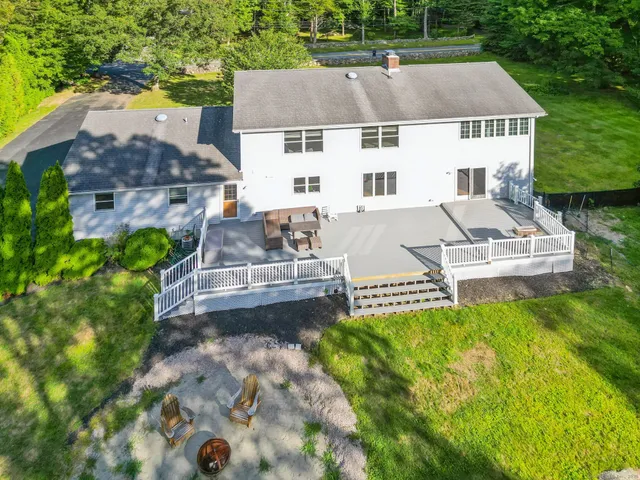 an aerial view of a house with a garden