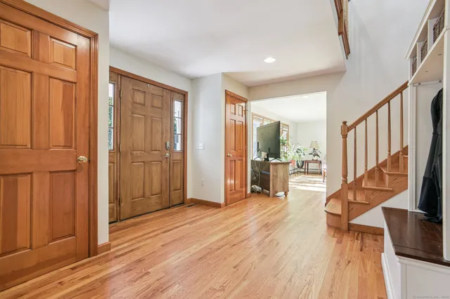 wooden floor and windows in an empty room with wooden floor