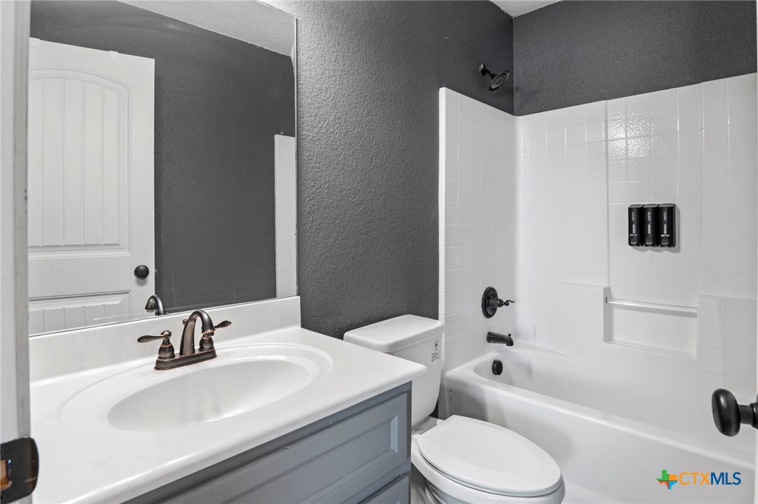 3710 Anvil Range Road Killeen, TX 76549 - Photo 23 of 32 a bathroom with a sink a toilet and a bathtub