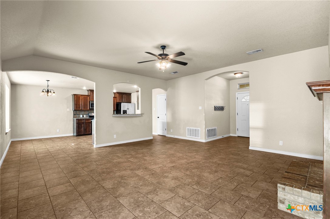 3710 Anvil Range Road Killeen, TX 76549 - Photo 9 of 32 an empty room with a kitchen and a sink