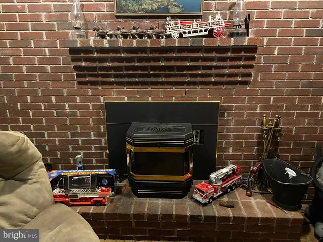 a spacious bedroom with a bed and furniture