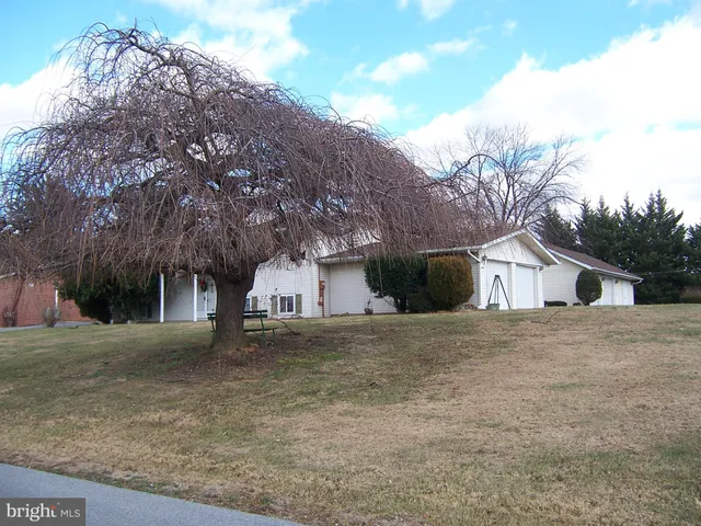 a house view with a outdoor space