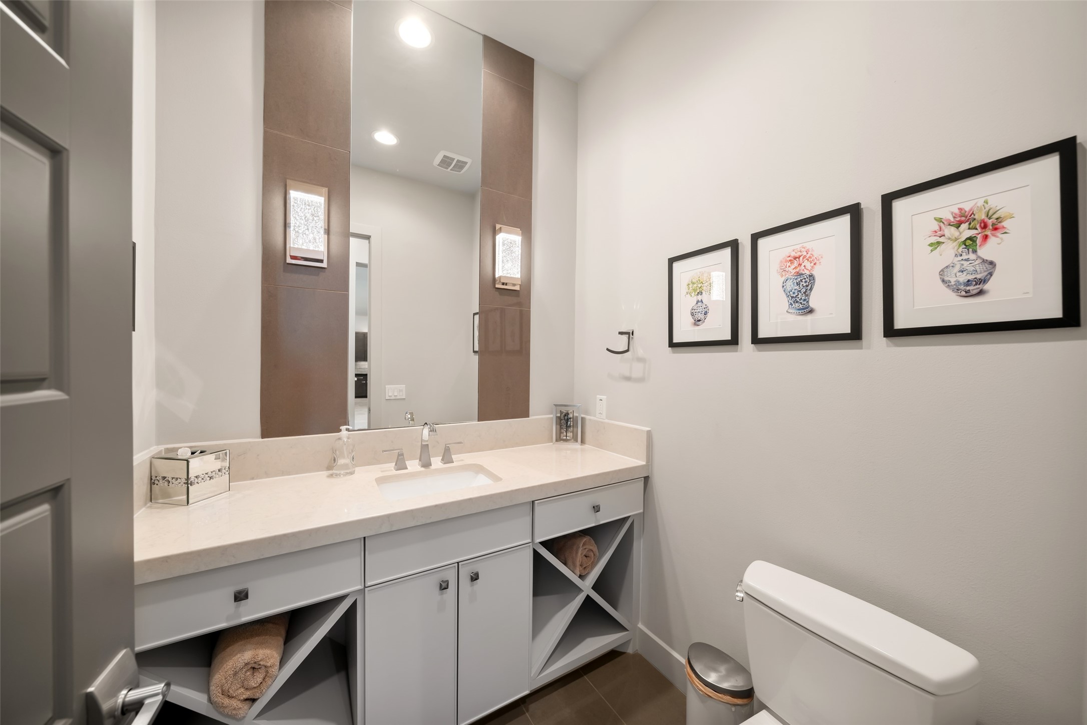 24902 Delaney Knoll Spring, TX 77389 - Photo 38 of 49 a bathroom with a toilet a sink and mirror