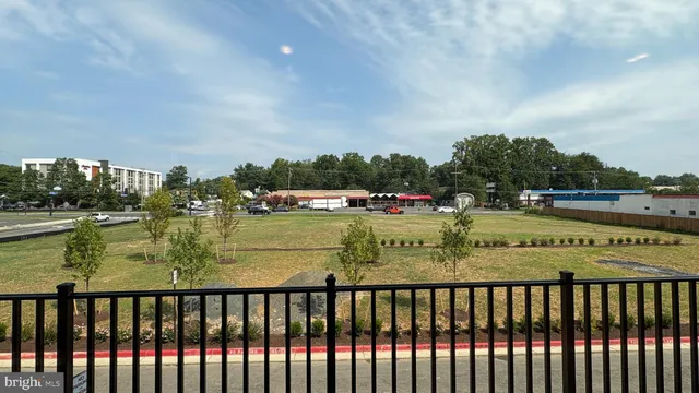 a view of swimming pool from a balcony