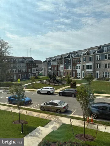 a view of a lake with a yard