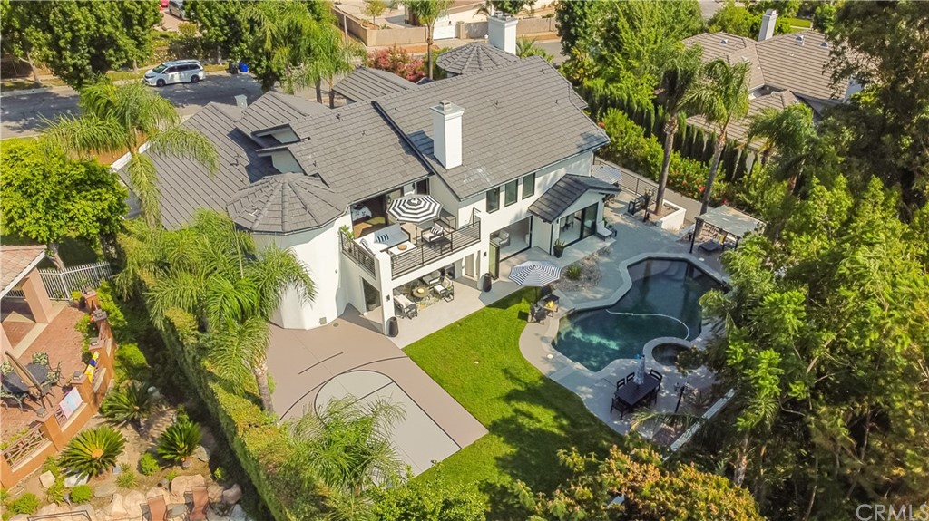 5000 Laredo Place Rancho Cucamonga, CA 91737 - Photo 1 of 1 an aerial view of a house with a garden and swimming pool