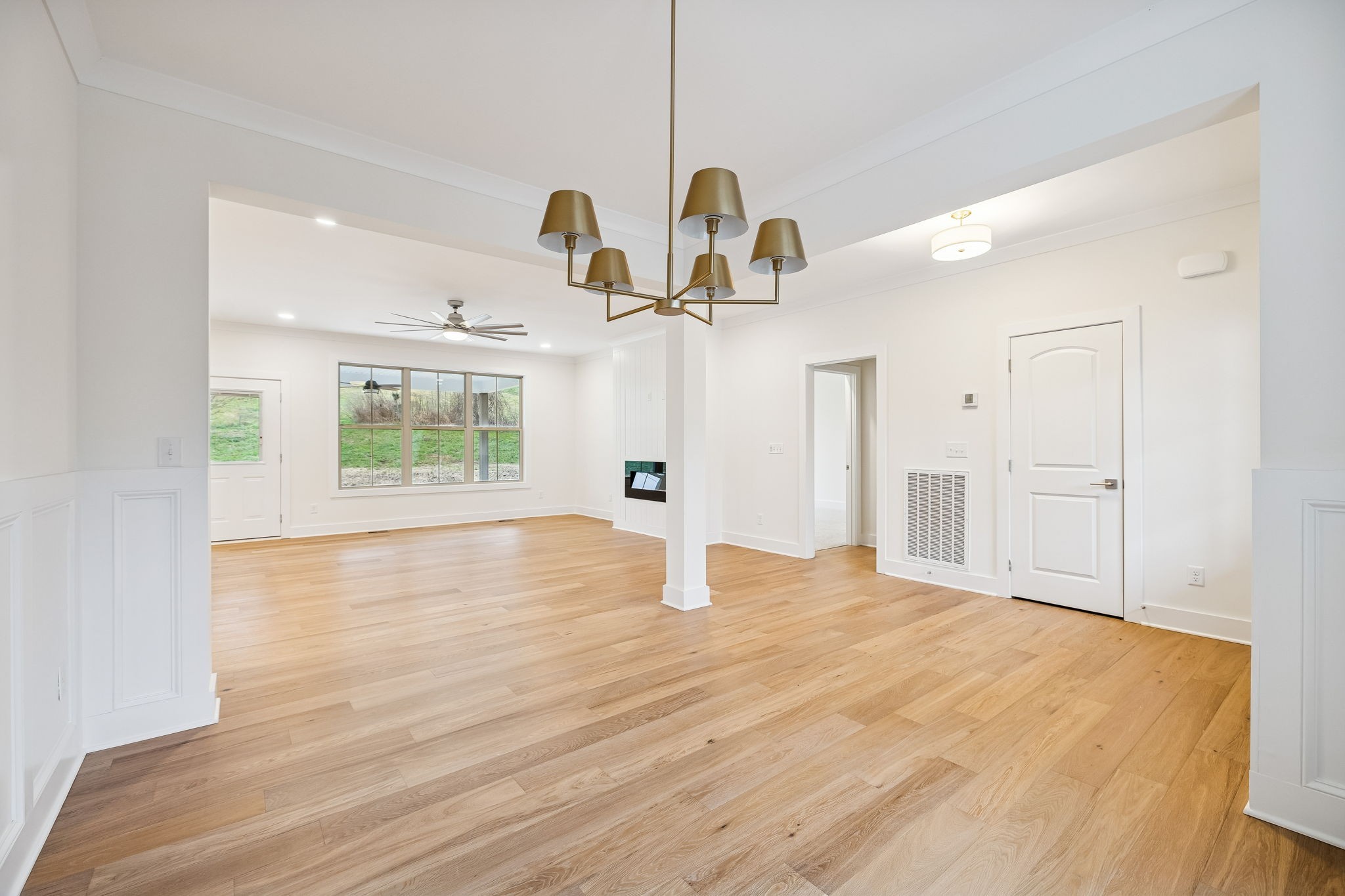 1561 Opossum Paw Road Beechgrove, TN 37018 - Photo 12 of 62 a view of empty room with wooden floor