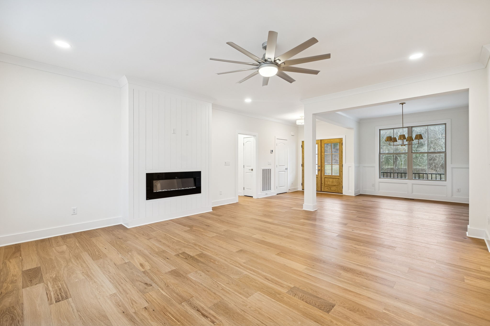 1561 Opossum Paw Road Beechgrove, TN 37018 - Photo 16 of 62 a view of a big room with wooden floor and windows