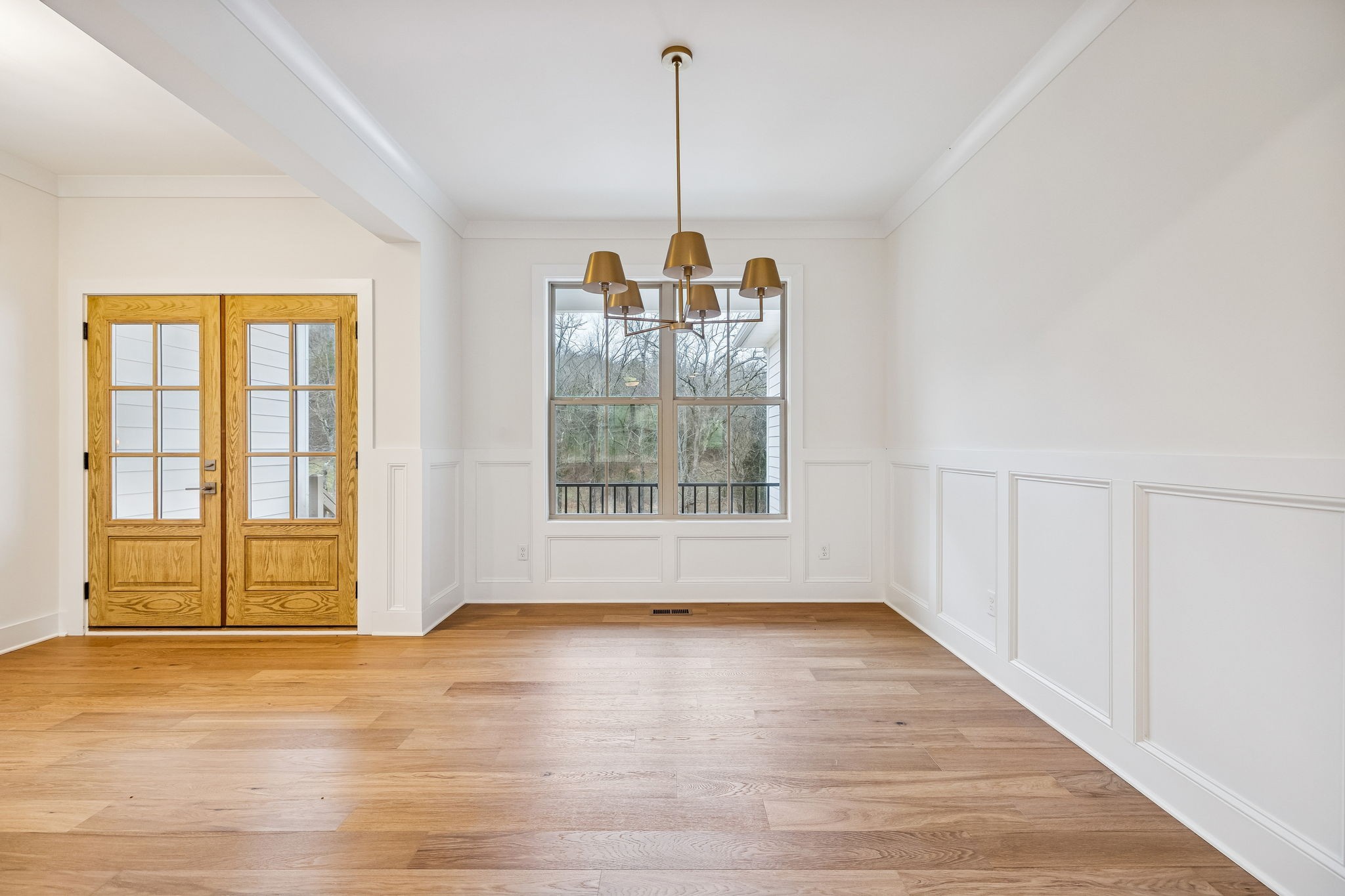 1561 Opossum Paw Road Beechgrove, TN 37018 - Photo 10 of 62 a view of empty room with wooden floor and fan