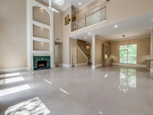 a living room with furniture rug and window