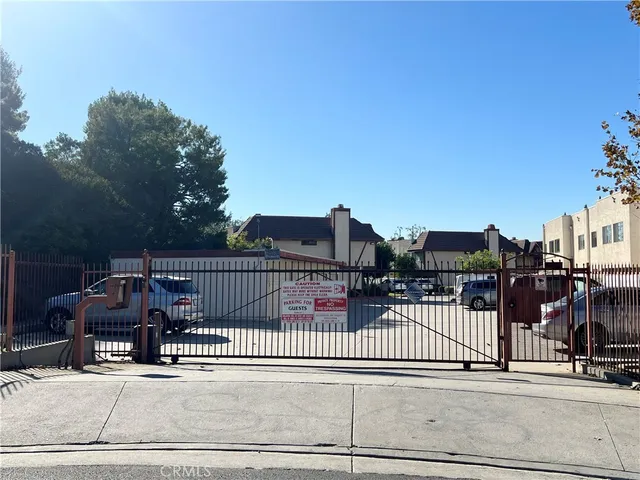 a view of a balcony with wooden floor