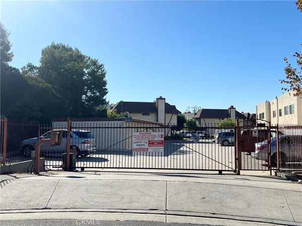 a view of a balcony with wooden floor