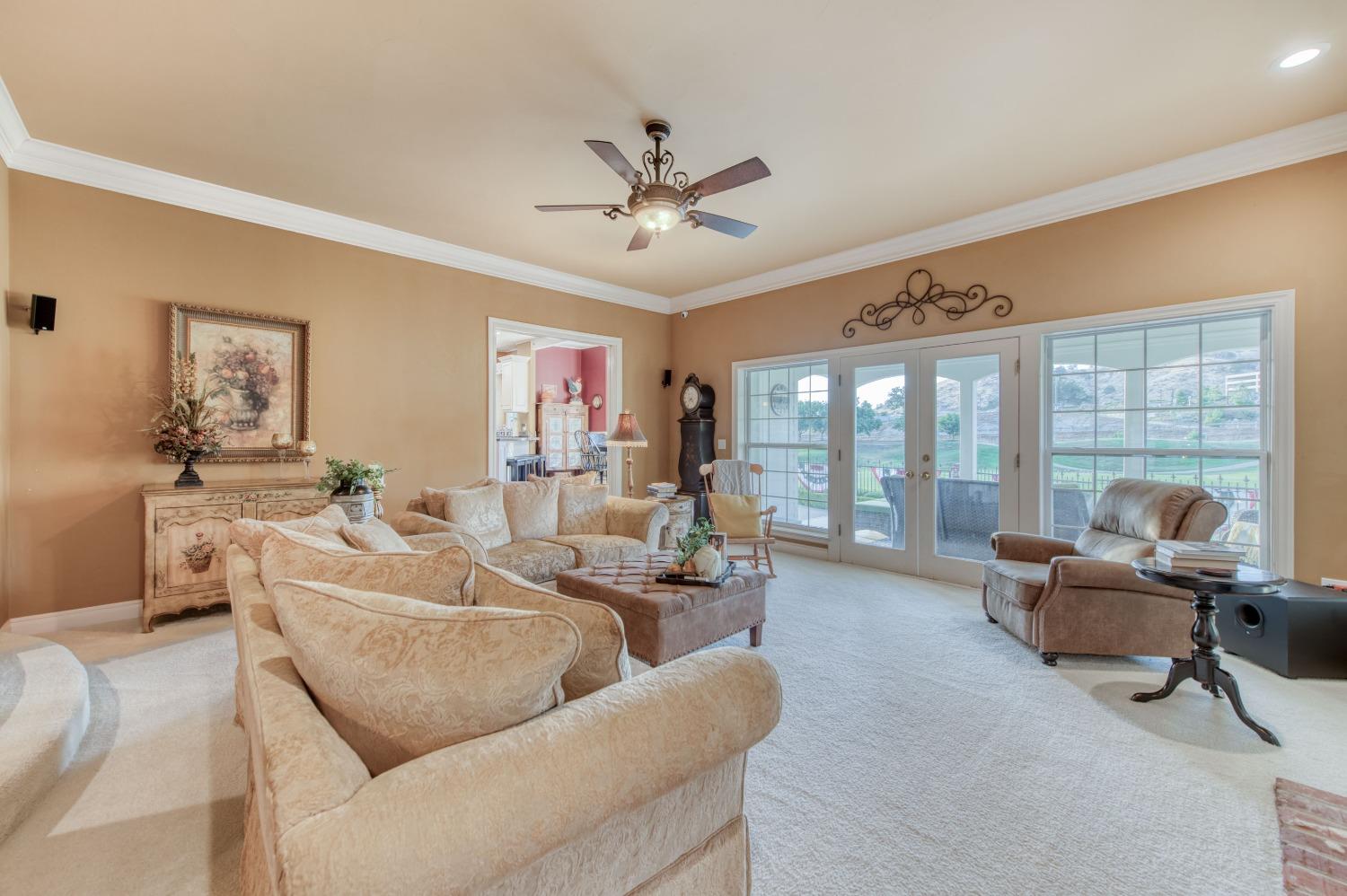 21672 Westmere Lane Friant, CA 93626 - Photo 20 of 80 a living room with furniture and a large window