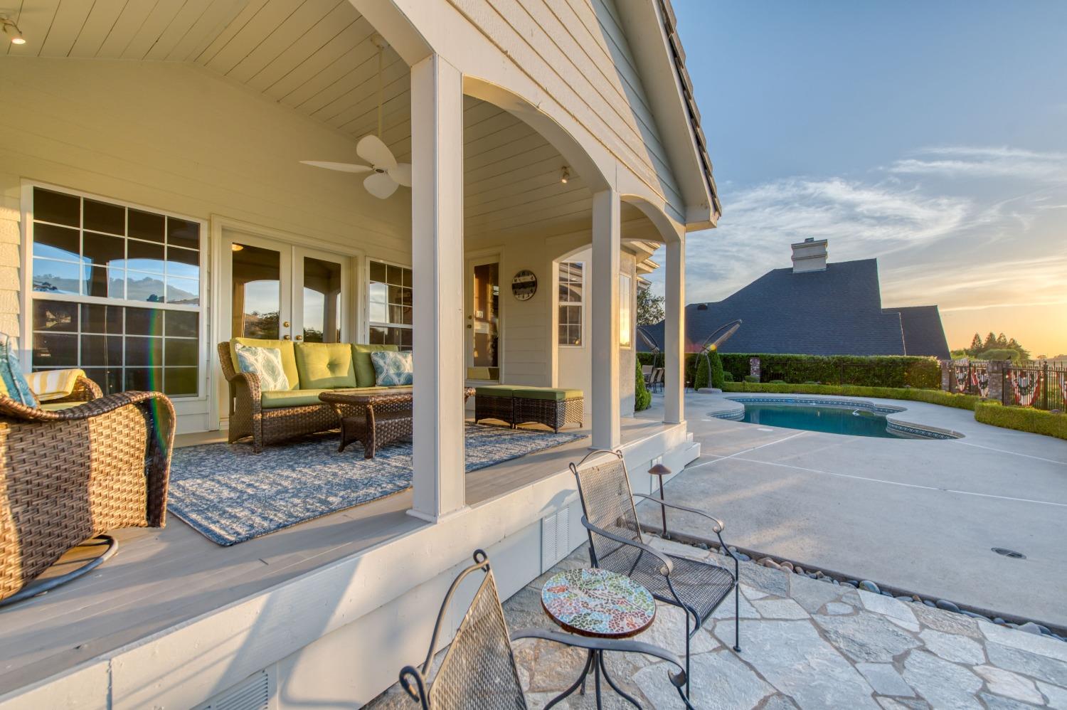 21672 Westmere Lane Friant, CA 93626 - Photo 52 of 80 a view of a porch with furniture