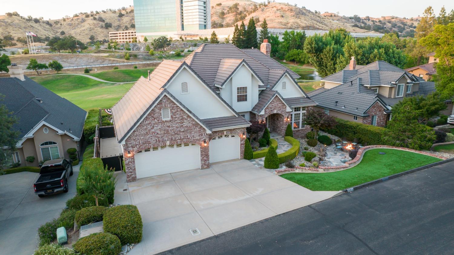 21672 Westmere Lane Friant, CA 93626 - Photo 73 of 80 an aerial view of multiple houses with a yard