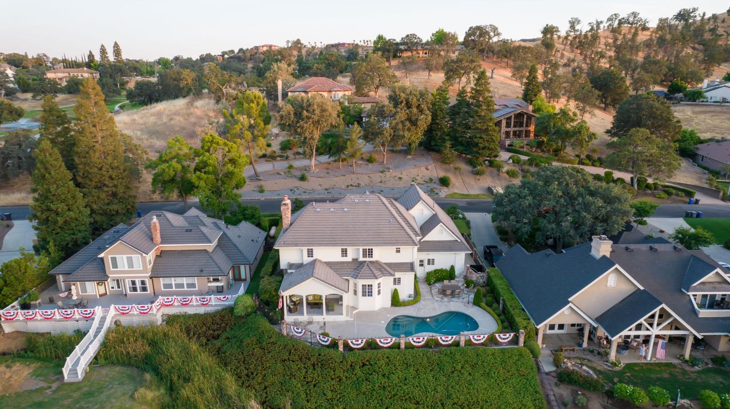 21672 Westmere Lane Friant, CA 93626 - Photo 76 of 80 an aerial view of residential houses with outdoor space and street view