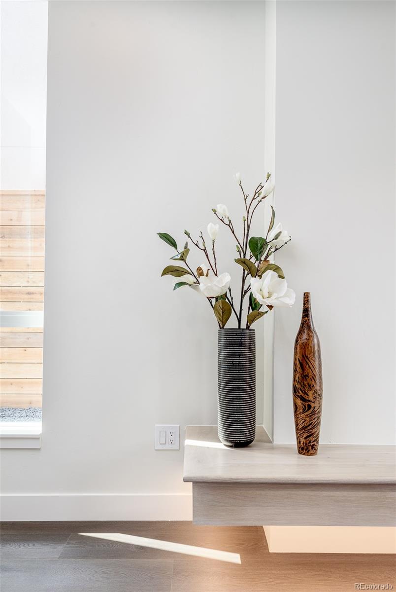 3865 Stuart Street Denver, CO 80212 - Photo 12 of 32 a vase of flowers sitting on a table