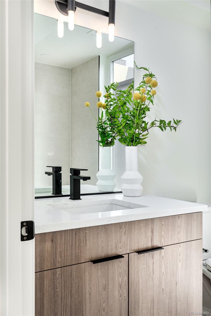 3865 Stuart Street Denver, CO 80212 - Photo 19 of 32 a close view of sink and mirror
