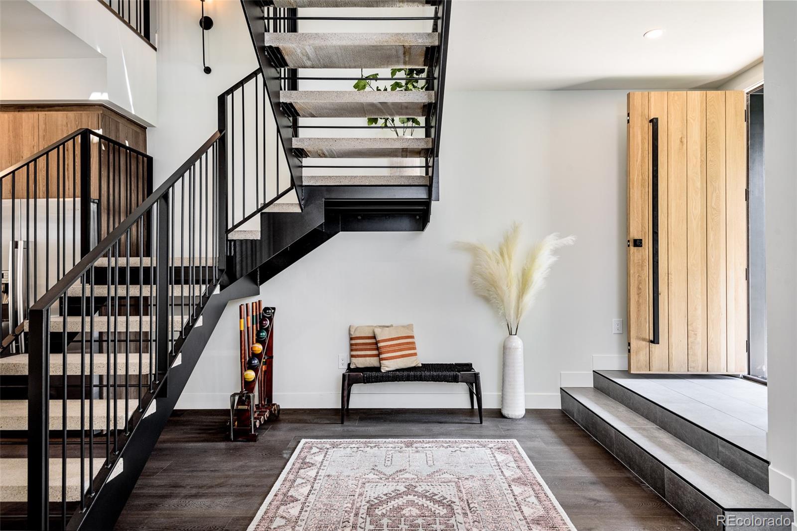 3865 Stuart Street Denver, CO 80212 - Photo 3 of 32 a living room with furniture and a window