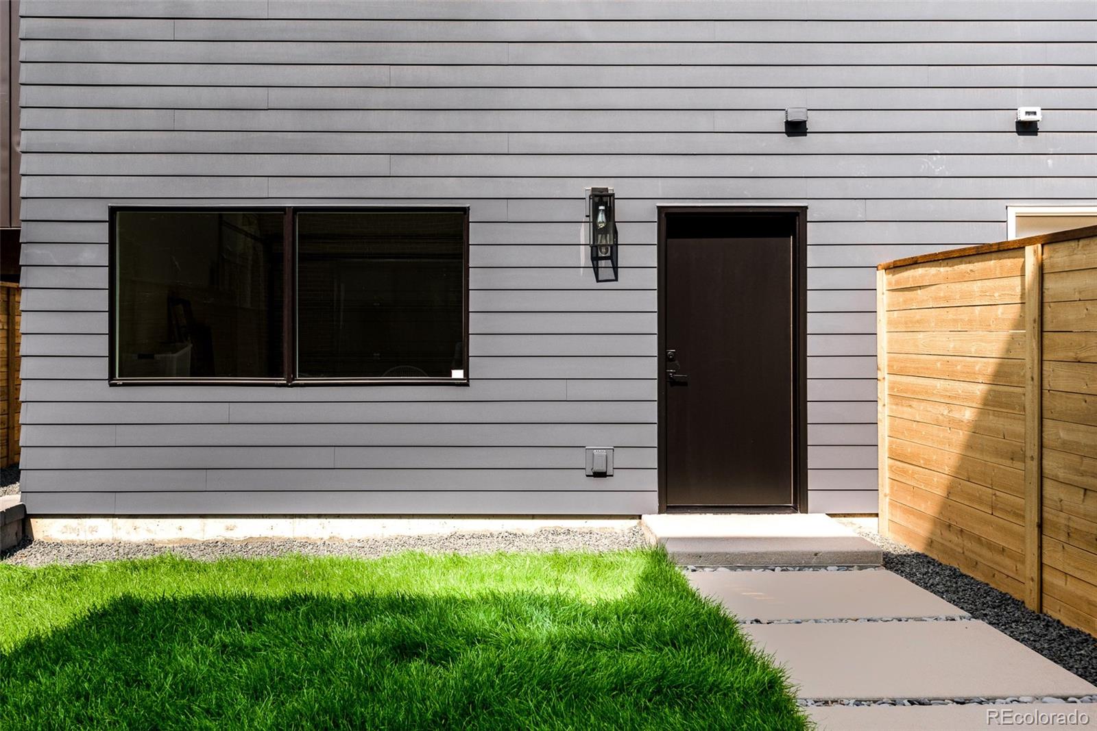 3865 Stuart Street Denver, CO 80212 - Photo 32 of 32 a view of a house with a window