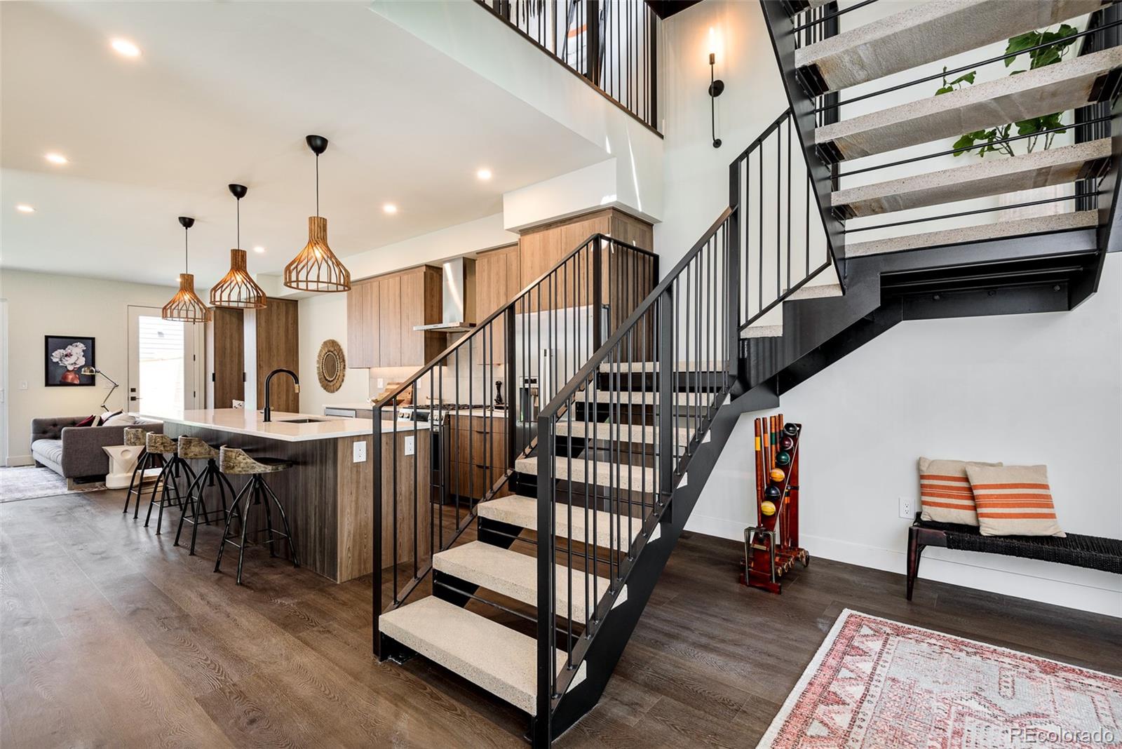 3865 Stuart Street Denver, CO 80212 - Photo 5 of 32 a view of entryway and hall with wooden floor