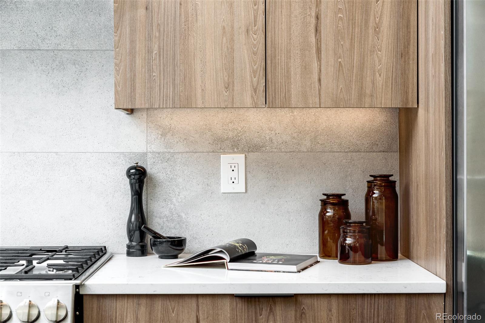 3865 Stuart Street Denver, CO 80212 - Photo 7 of 32 a room with a stove and cabinets