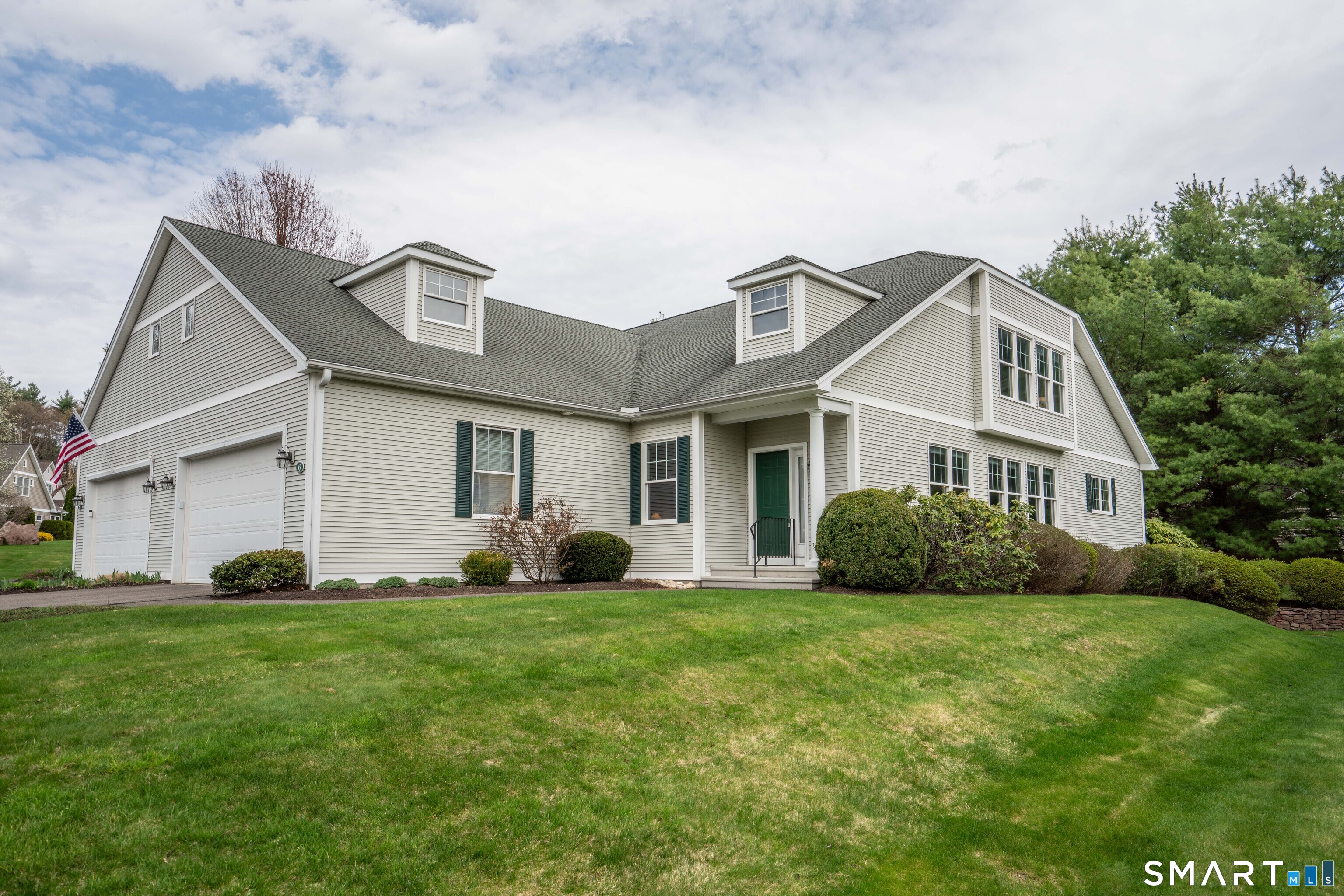6 Bittersweet Lane, Unit 6 Avon, CT 06001 - Photo 1 of 39 a front view of house with yard and green space