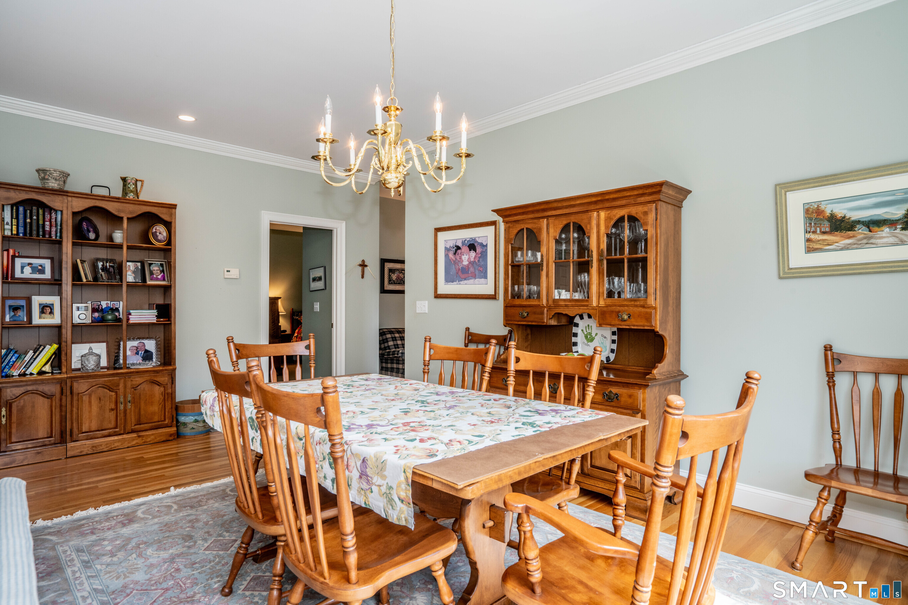 6 Bittersweet Lane, Unit 6 Avon, CT 06001 - Photo 11 of 39 a view of a dining room with furniture a rug and wooden floor