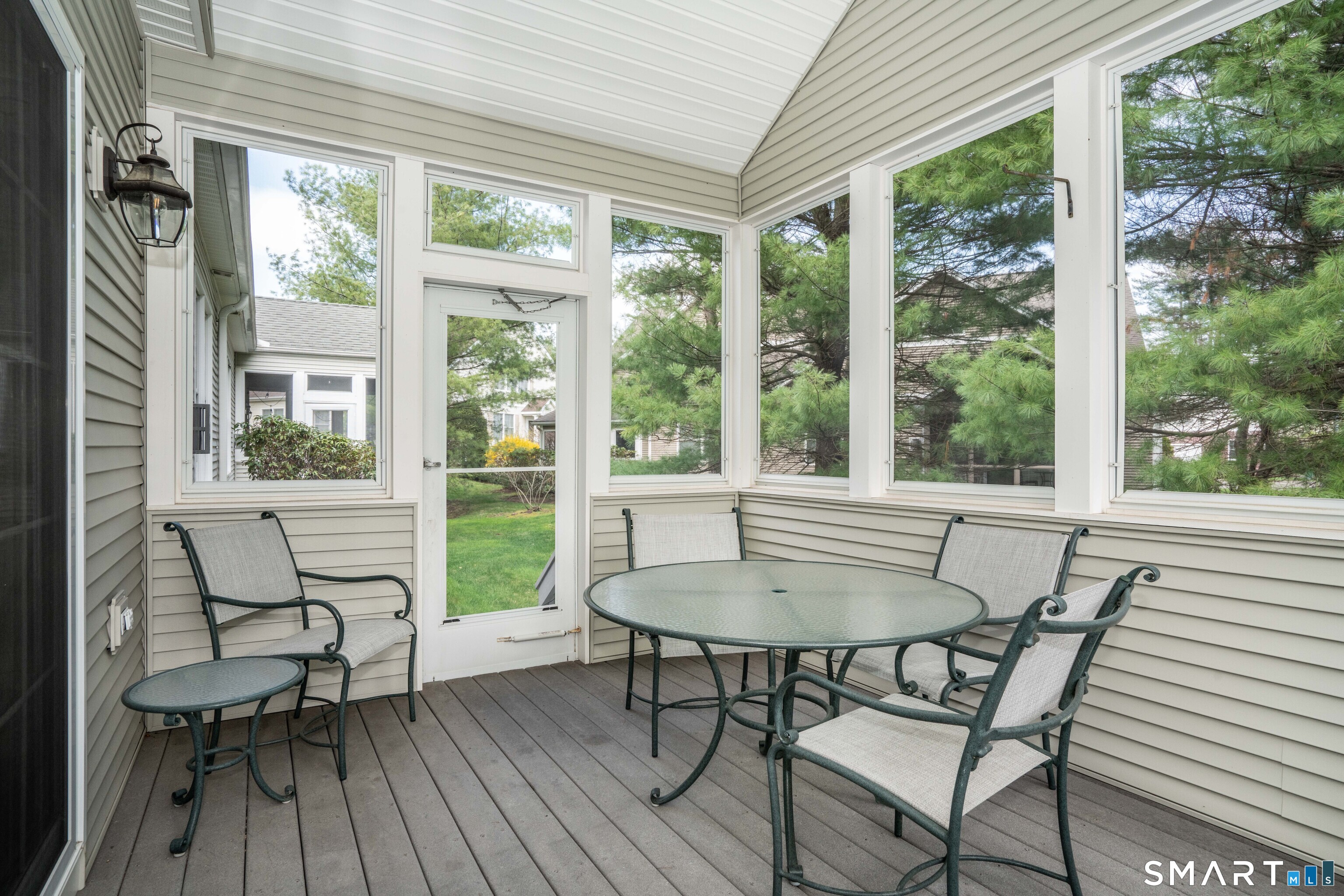 6 Bittersweet Lane, Unit 6 Avon, CT 06001 - Photo 19 of 39 a view of a dining room with furniture window and outside view