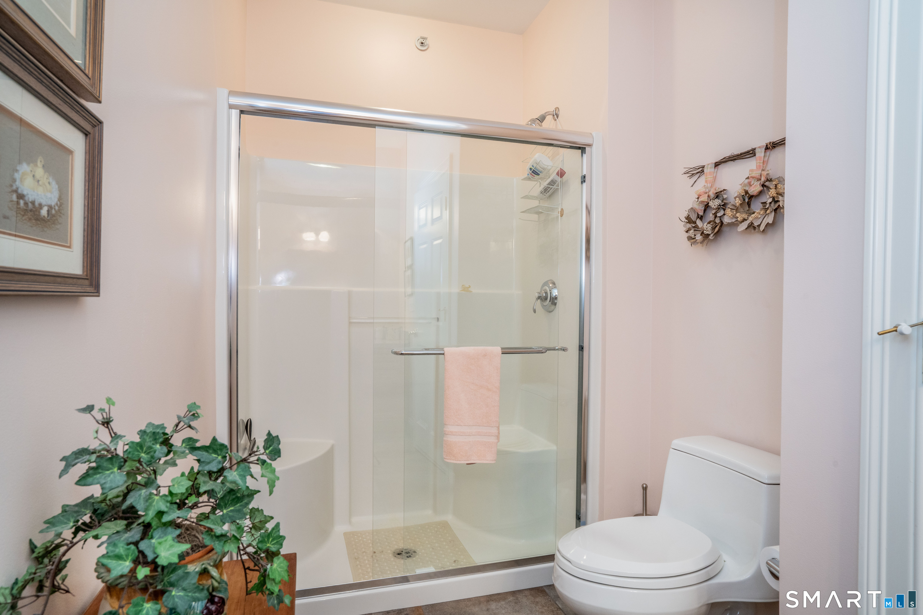 6 Bittersweet Lane, Unit 6 Avon, CT 06001 - Photo 23 of 39 a bathroom with a shower and a toilet