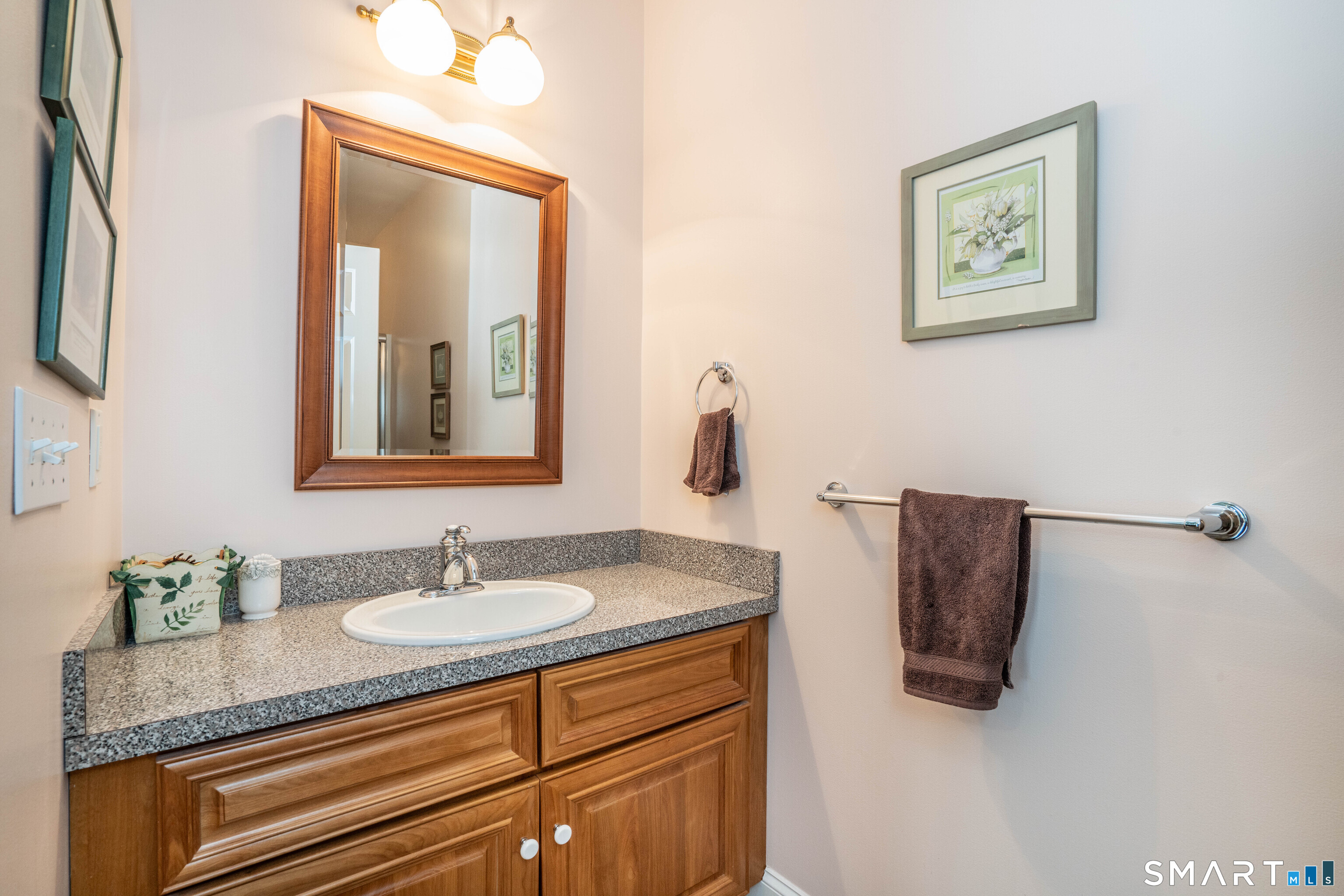 6 Bittersweet Lane, Unit 6 Avon, CT 06001 - Photo 24 of 39 a bathroom with a sink and a mirror