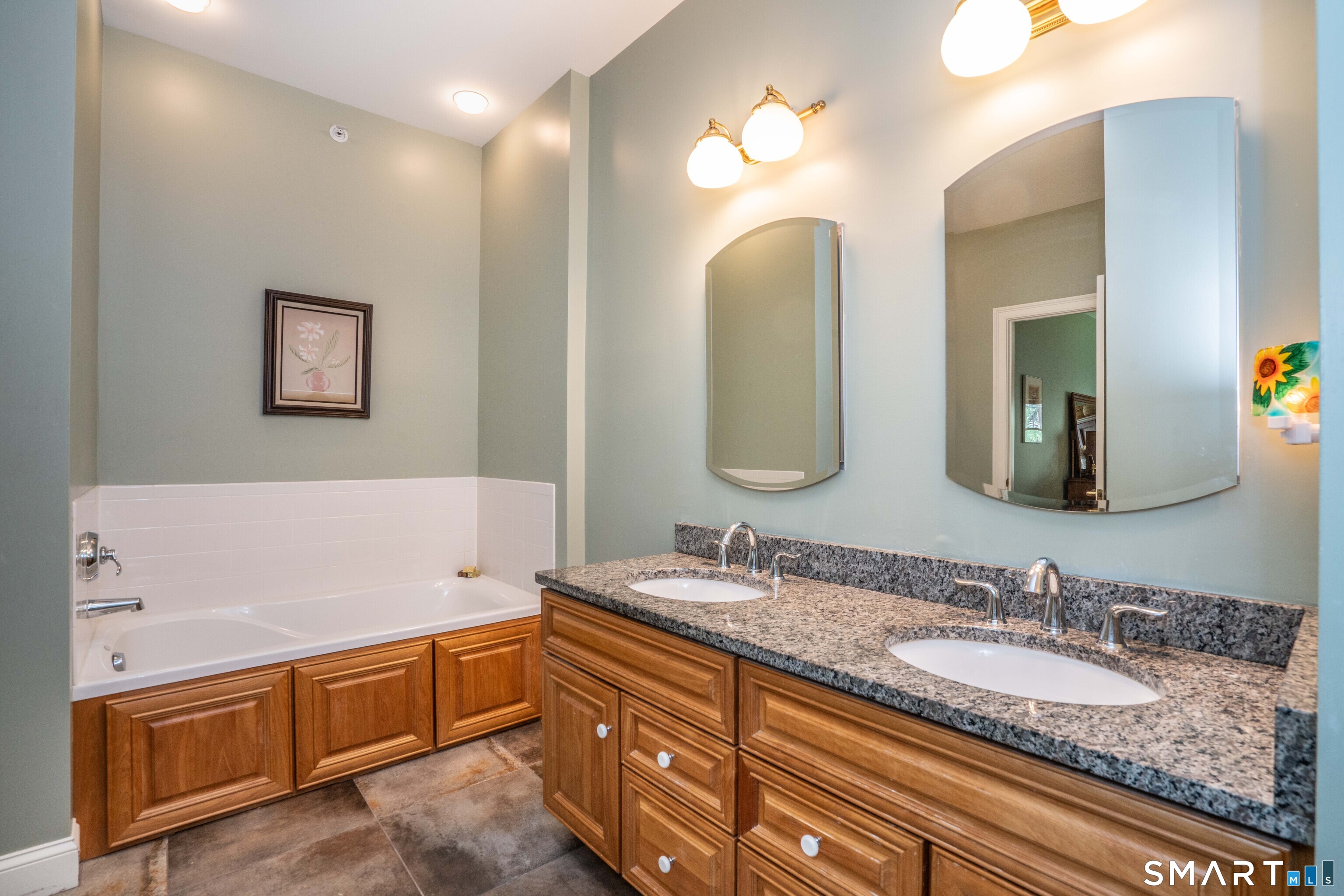 6 Bittersweet Lane, Unit 6 Avon, CT 06001 - Photo 27 of 39 a bathroom with a granite countertop double vanity sink and a mirror